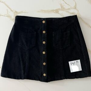 Size M black corduroy mini skirt for sale. Good condition - only worn once.